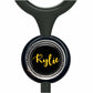 A black and silver stethoscope with a personalized name badge attached to it.