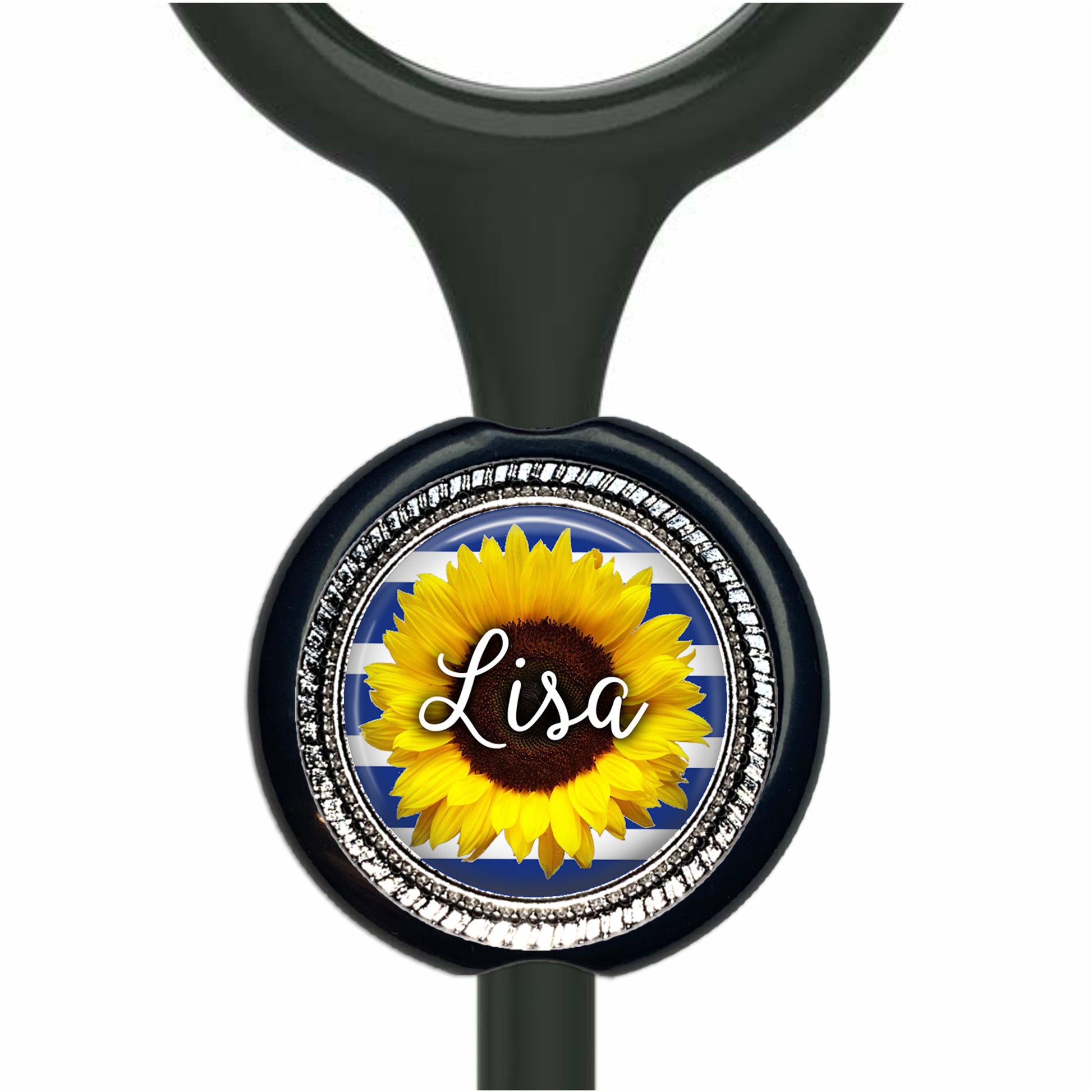 A black stethoscope with a round, personalized nameplate featuring a yellow sunflower.