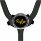 A black stethoscope with a personalized name badge on it.