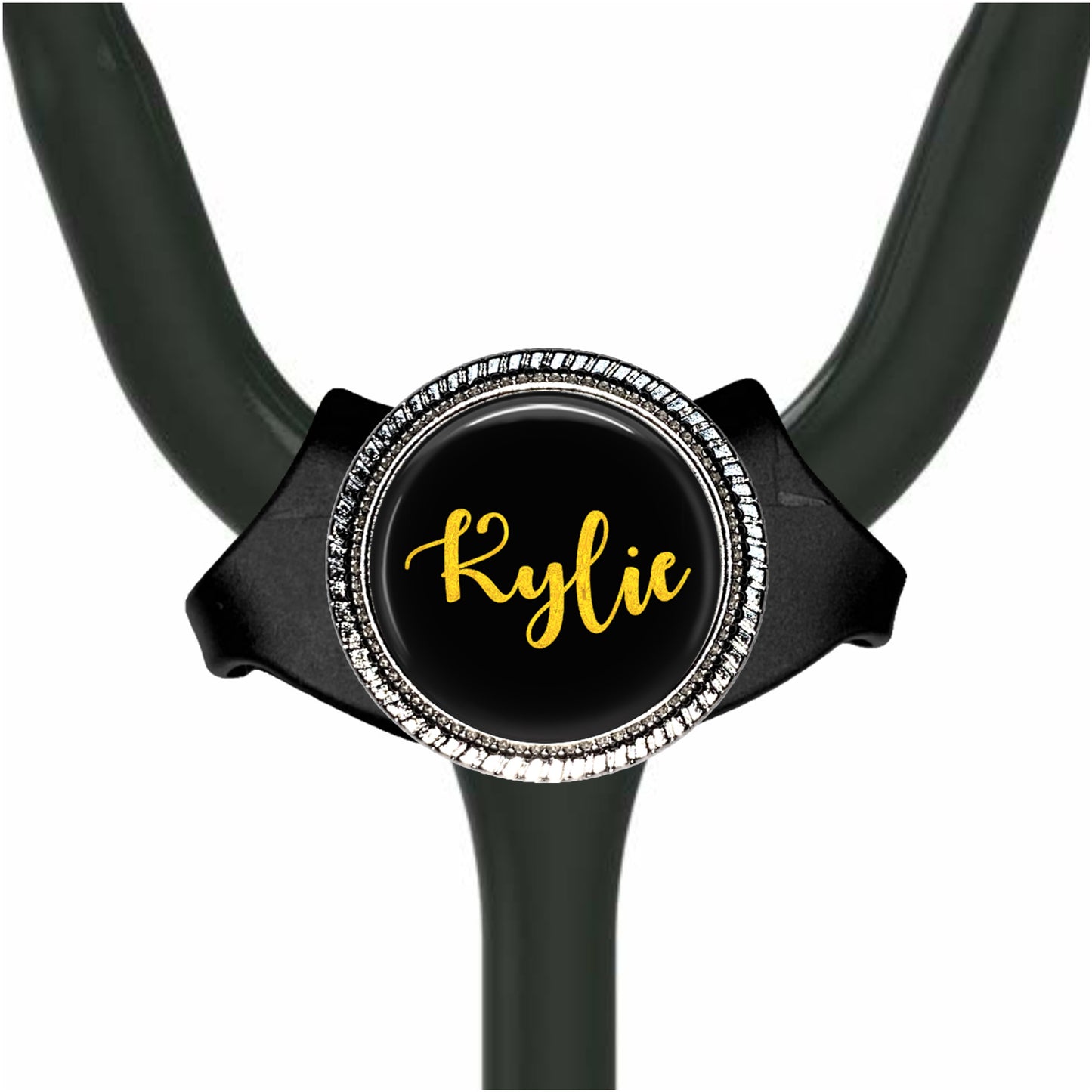 A black stethoscope with a personalized name badge on it.
