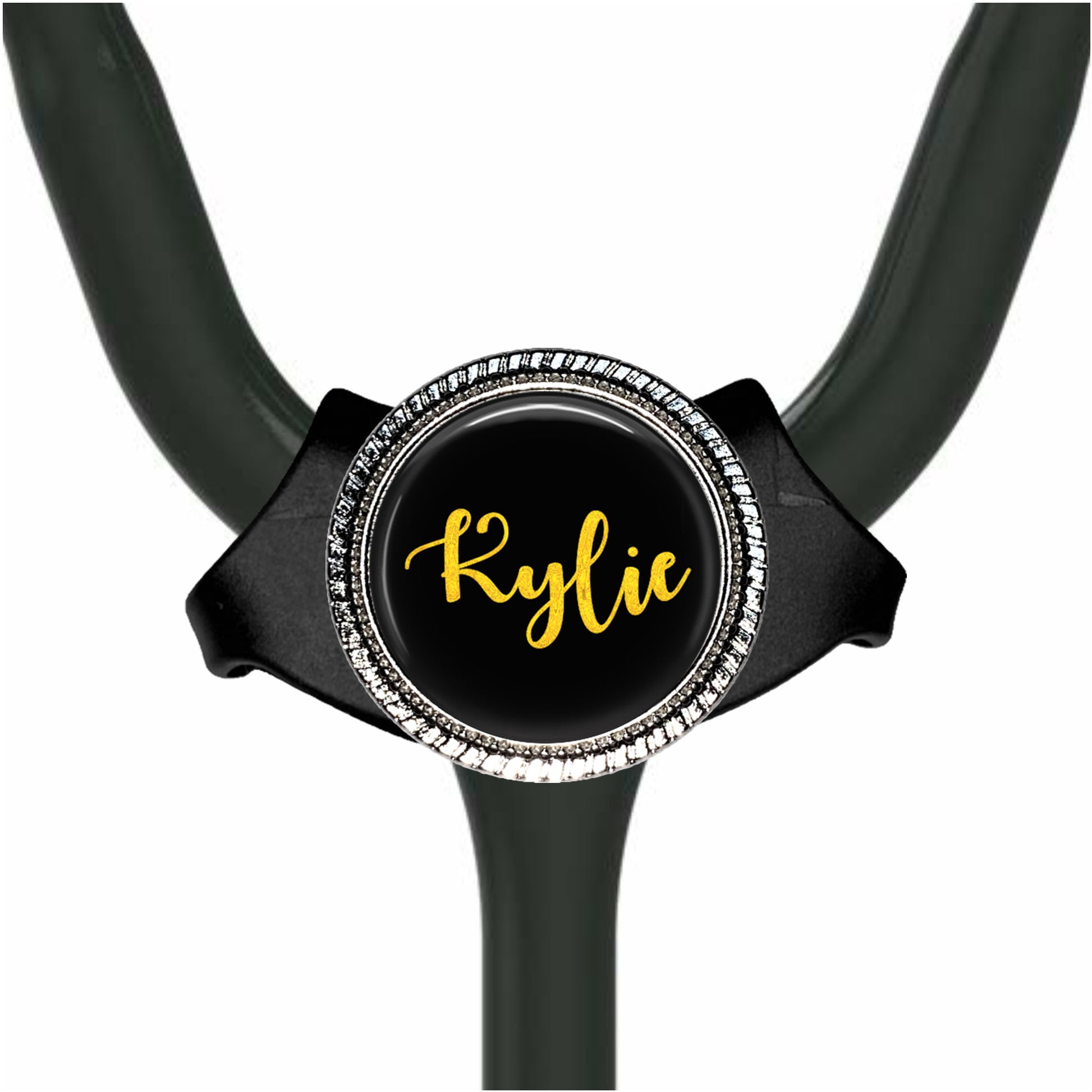 A black stethoscope with a personalized name badge on it.