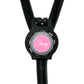 A black stethoscope with a personalized name badge attached to it.