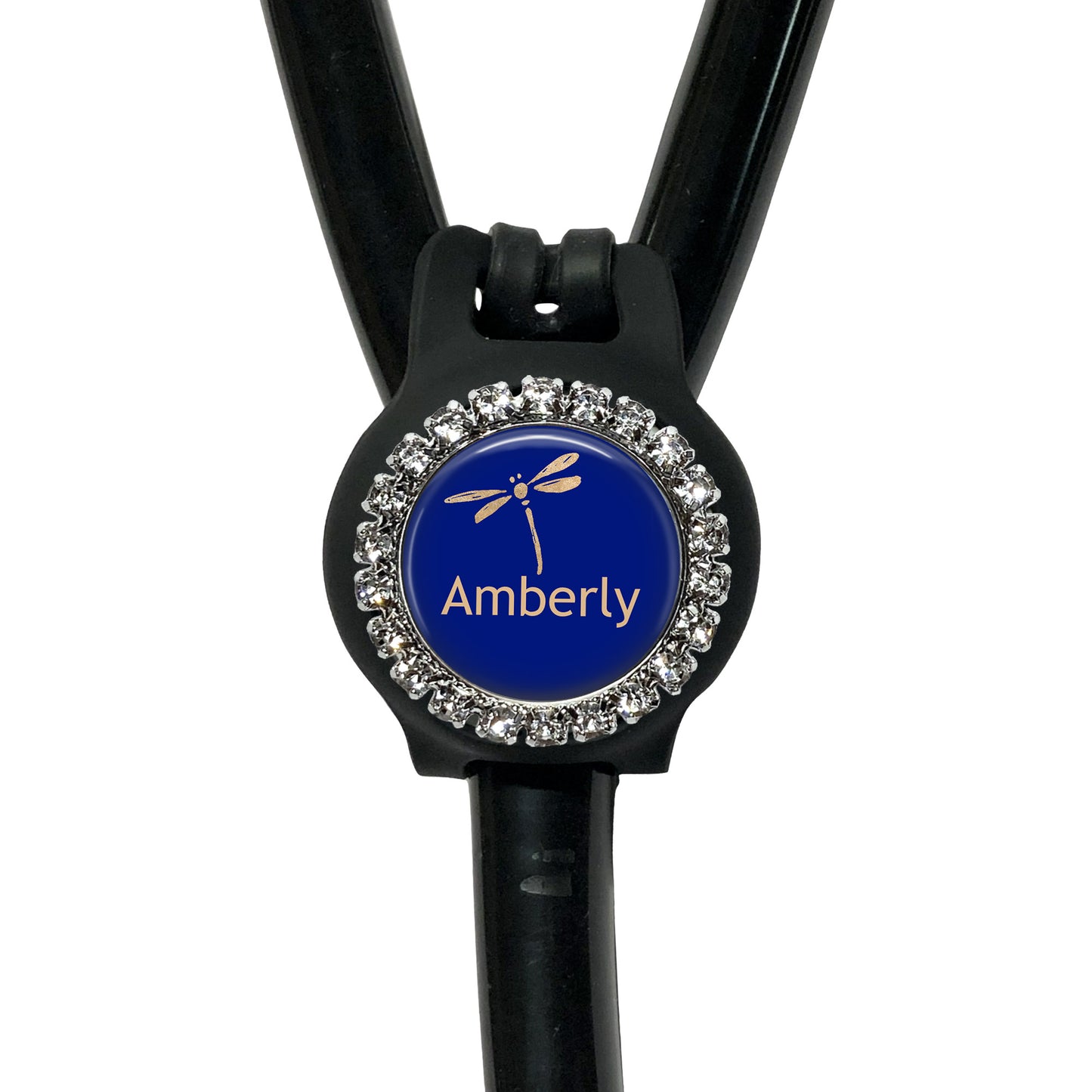 A black stethoscope with a blue and silver rhinestone-encrusted circular badge that says "Amberly".