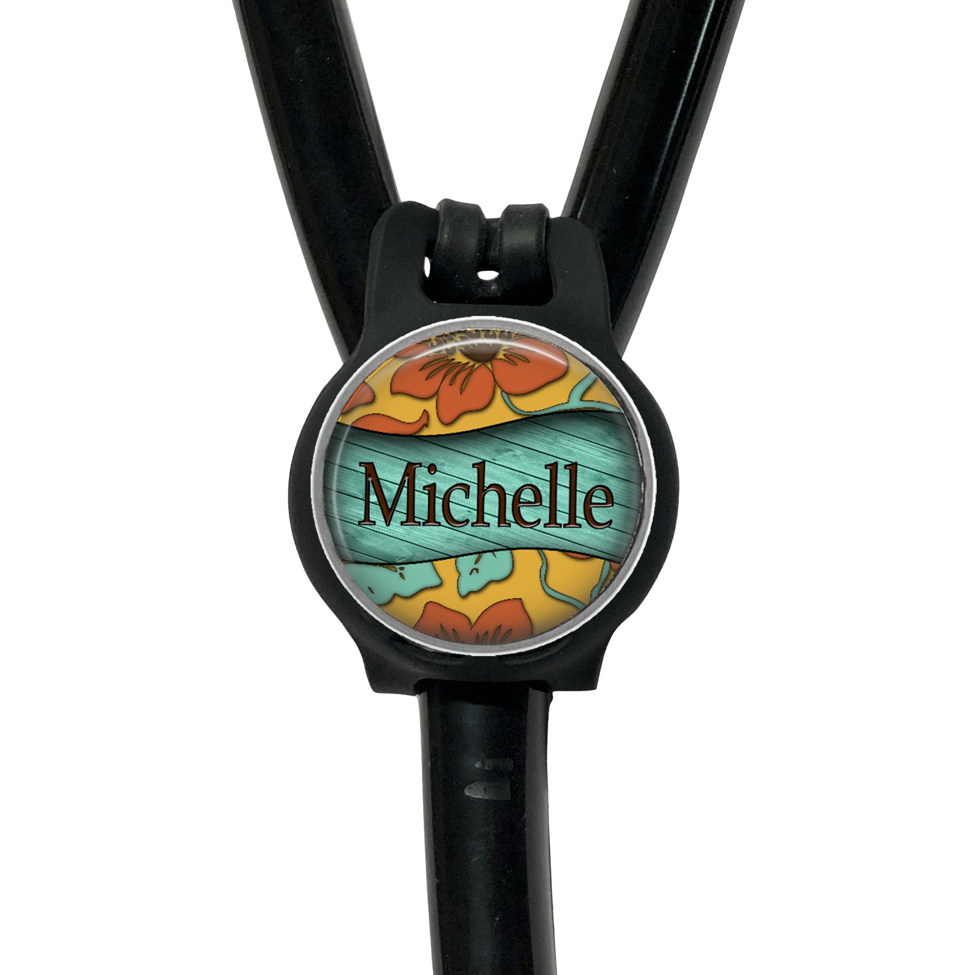 A stethoscope with a personalized name badge attached to it.