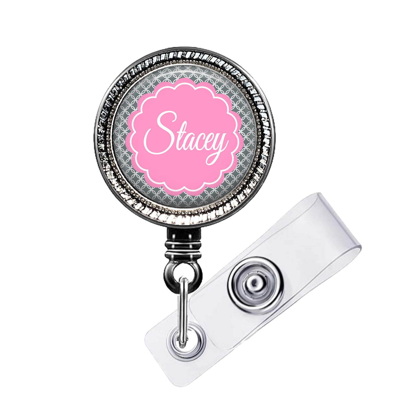 A personalized badge or lanyard with the name "Stacey" printed on it in a pink color.