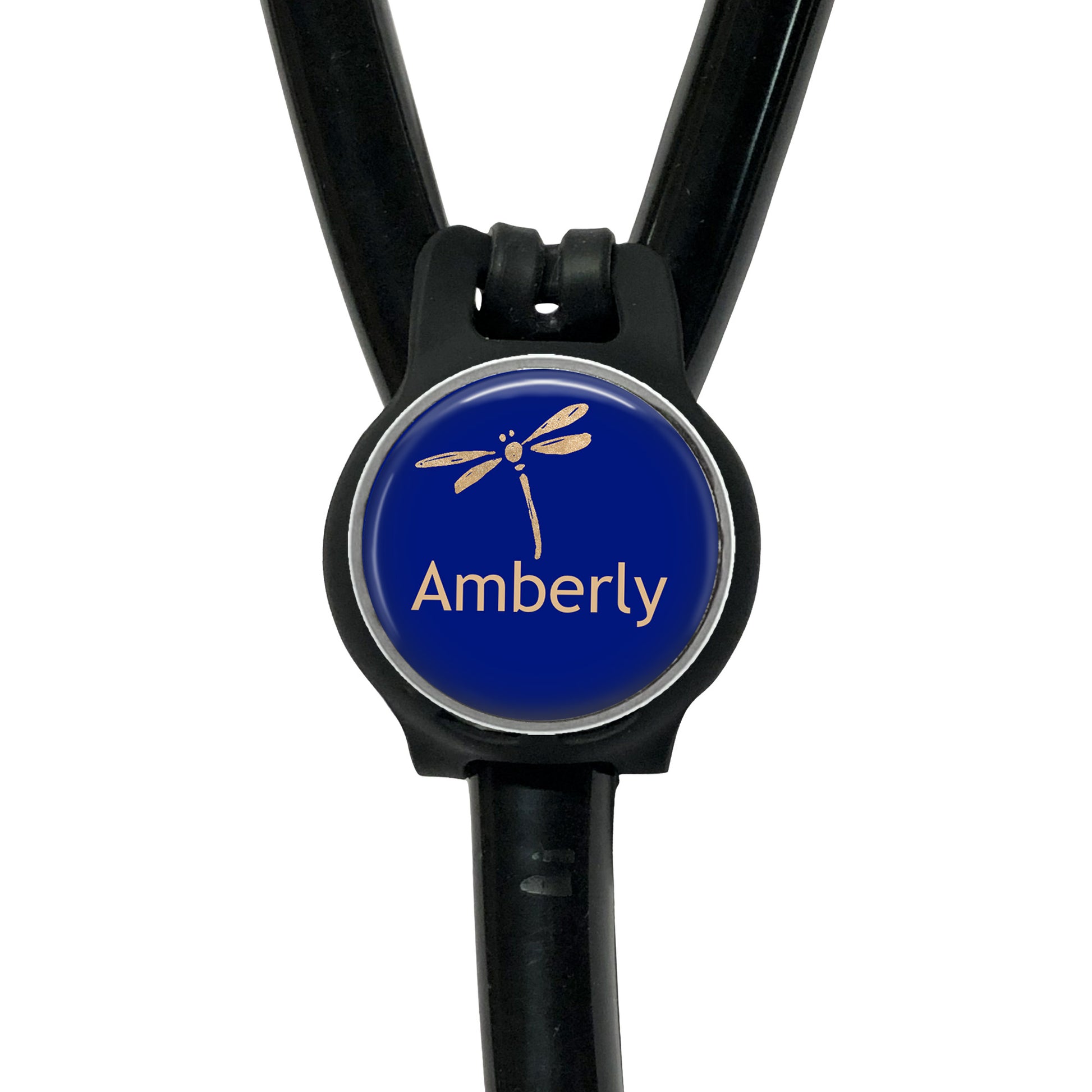 A blue circular badge with a dragonfly design, attached to a black strap or cord.