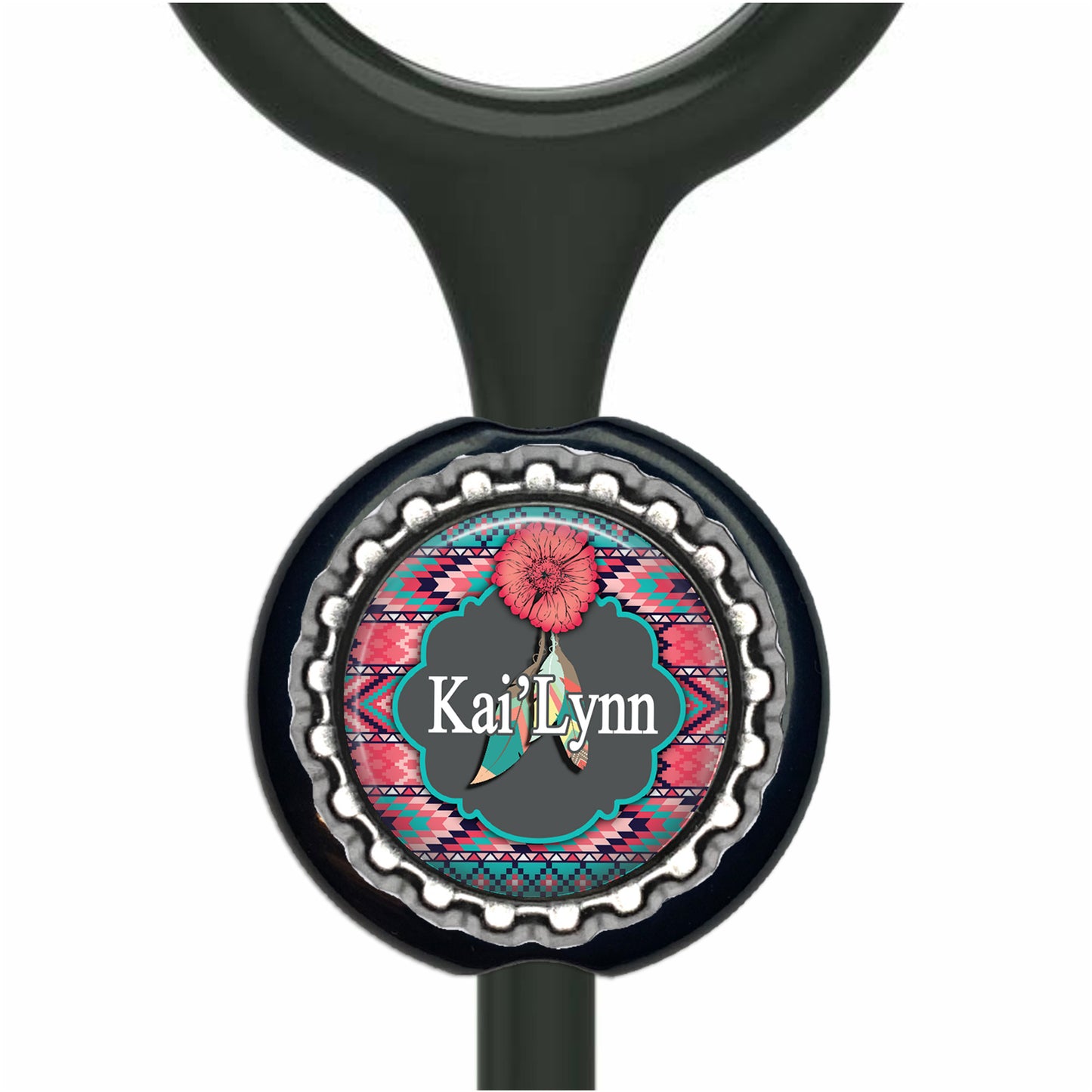 A black stethoscope with a colorful, decorative charm featuring a red flower and the name 'Kai Lynn' on it.
