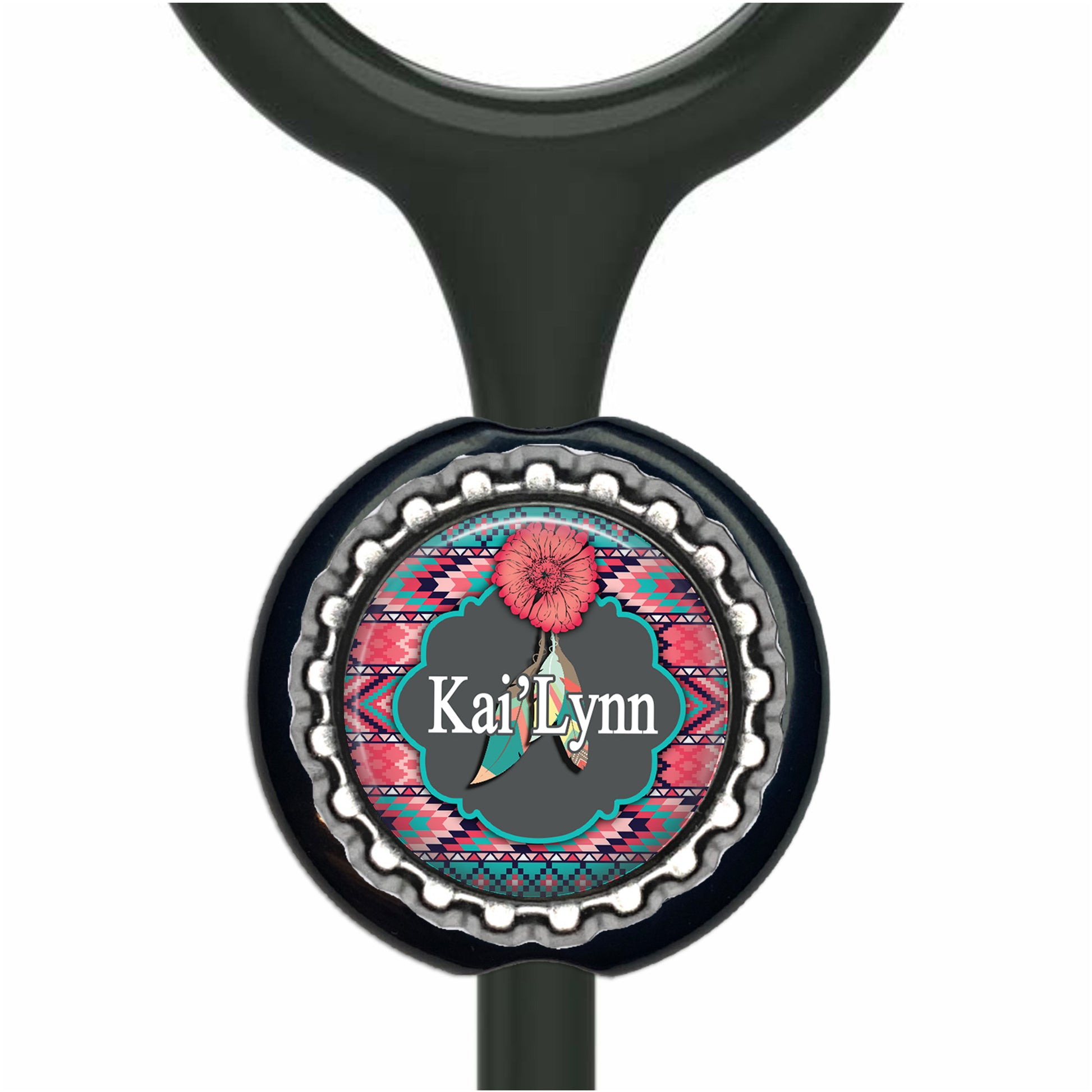 A black stethoscope with a colorful, decorative charm featuring a red flower and the name 'Kai Lynn' on it.