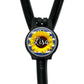 A black stethoscope with a round, personalized name tag attached to it.