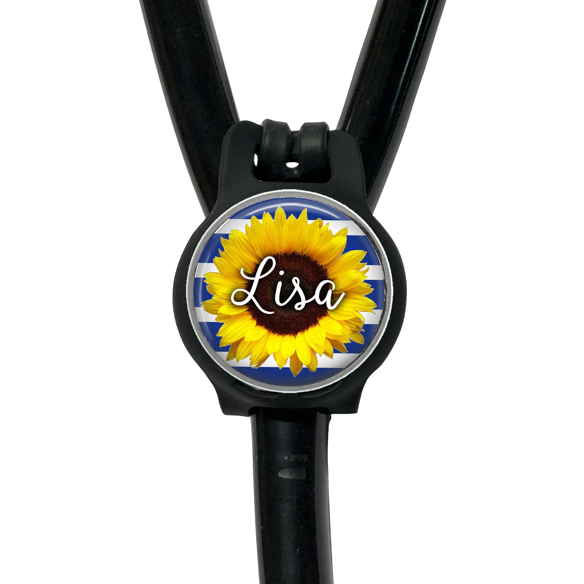 A black stethoscope with a round, personalized name tag attached to it.
