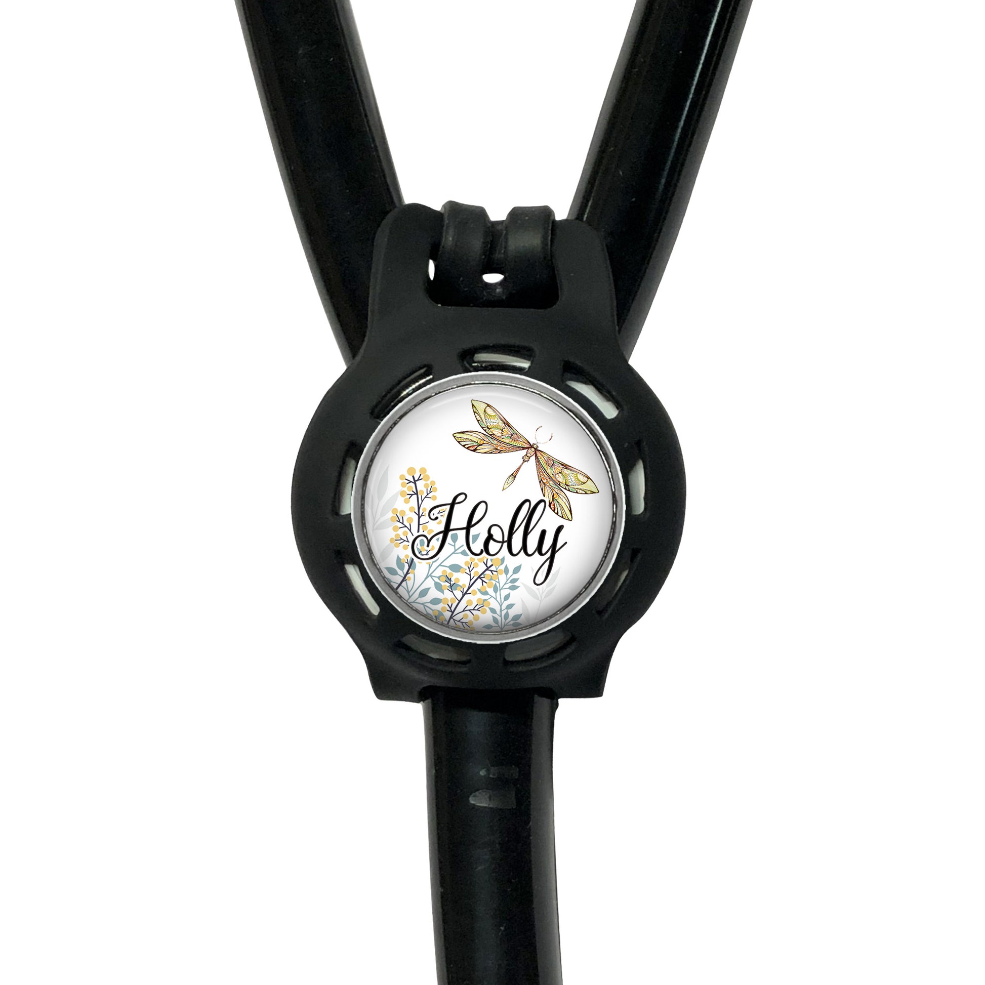A black stethoscope with a round decal on it, featuring a dragonfly and flowers.