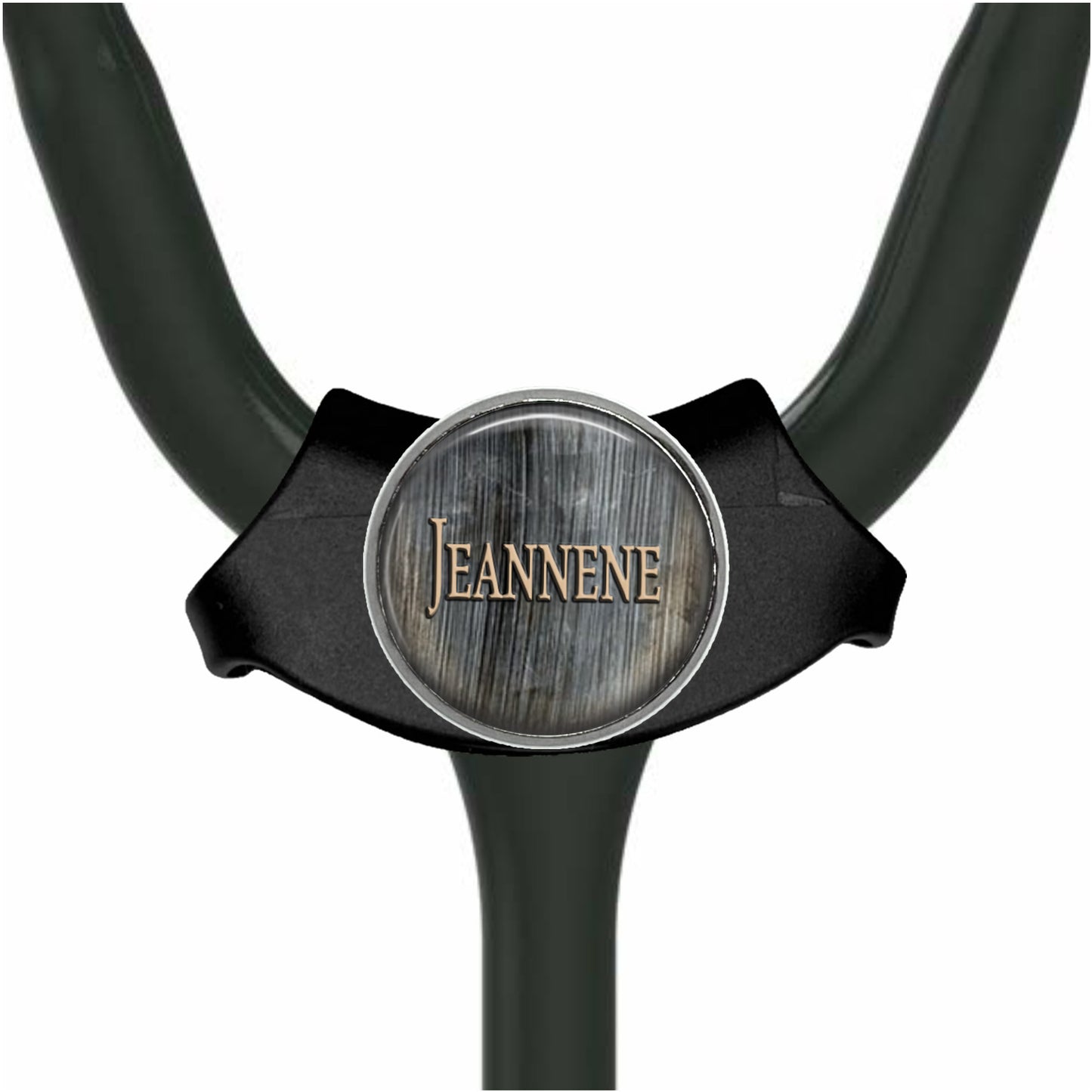 A black stethoscope with a silver circular badge that says "Jeanne" on it.