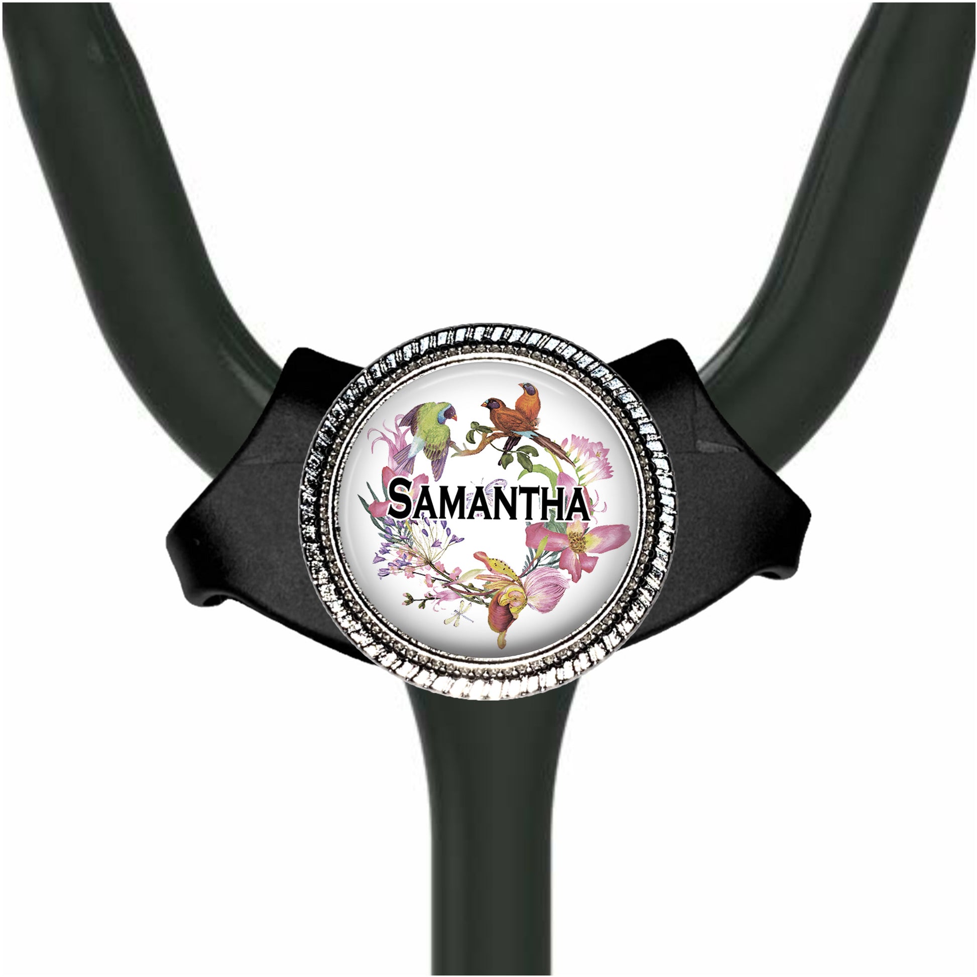 A personalized nameplate with a floral design, featuring a bird and various flowers.