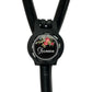A black stethoscope with a floral design on the circular part of the tubing.