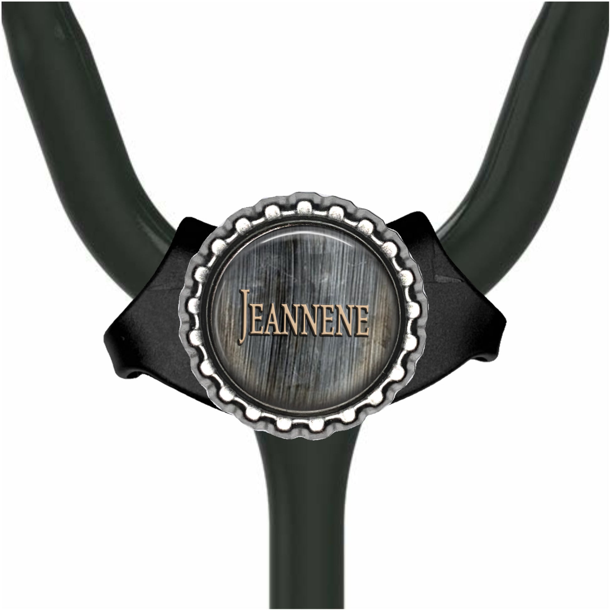 A black stethoscope with a silver-colored metal badge on the handle.