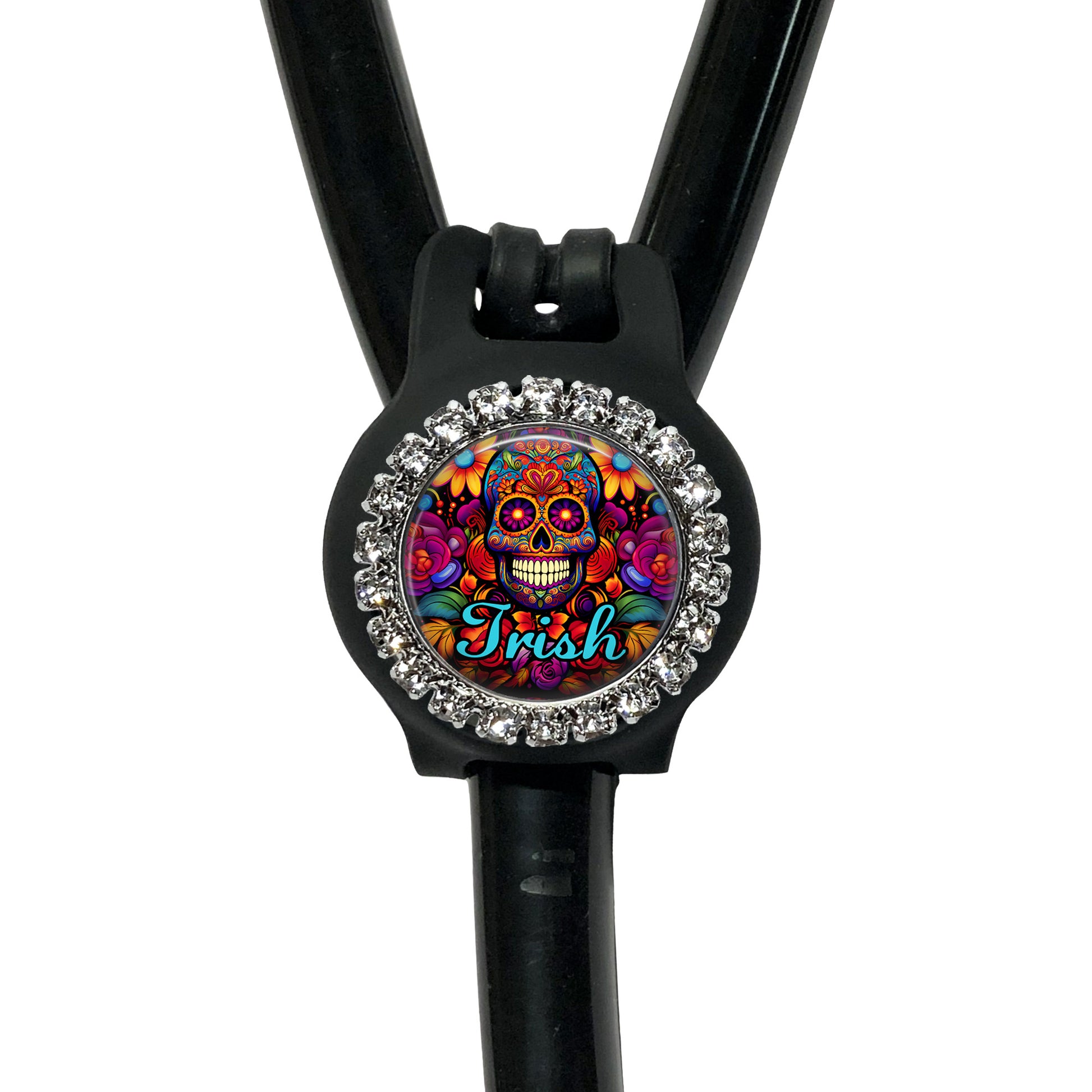 A black stethoscope with a colorful, circular charm featuring a skull design and the word "Irish" written on it.
