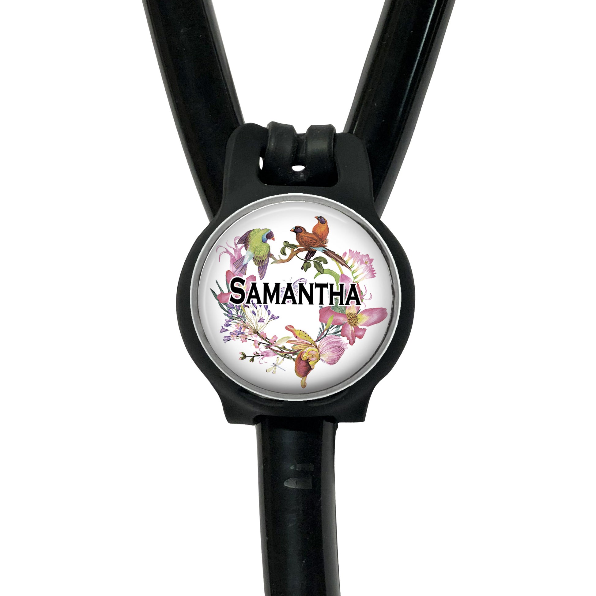A personalized nameplate with a floral design, attached to a stethoscope.