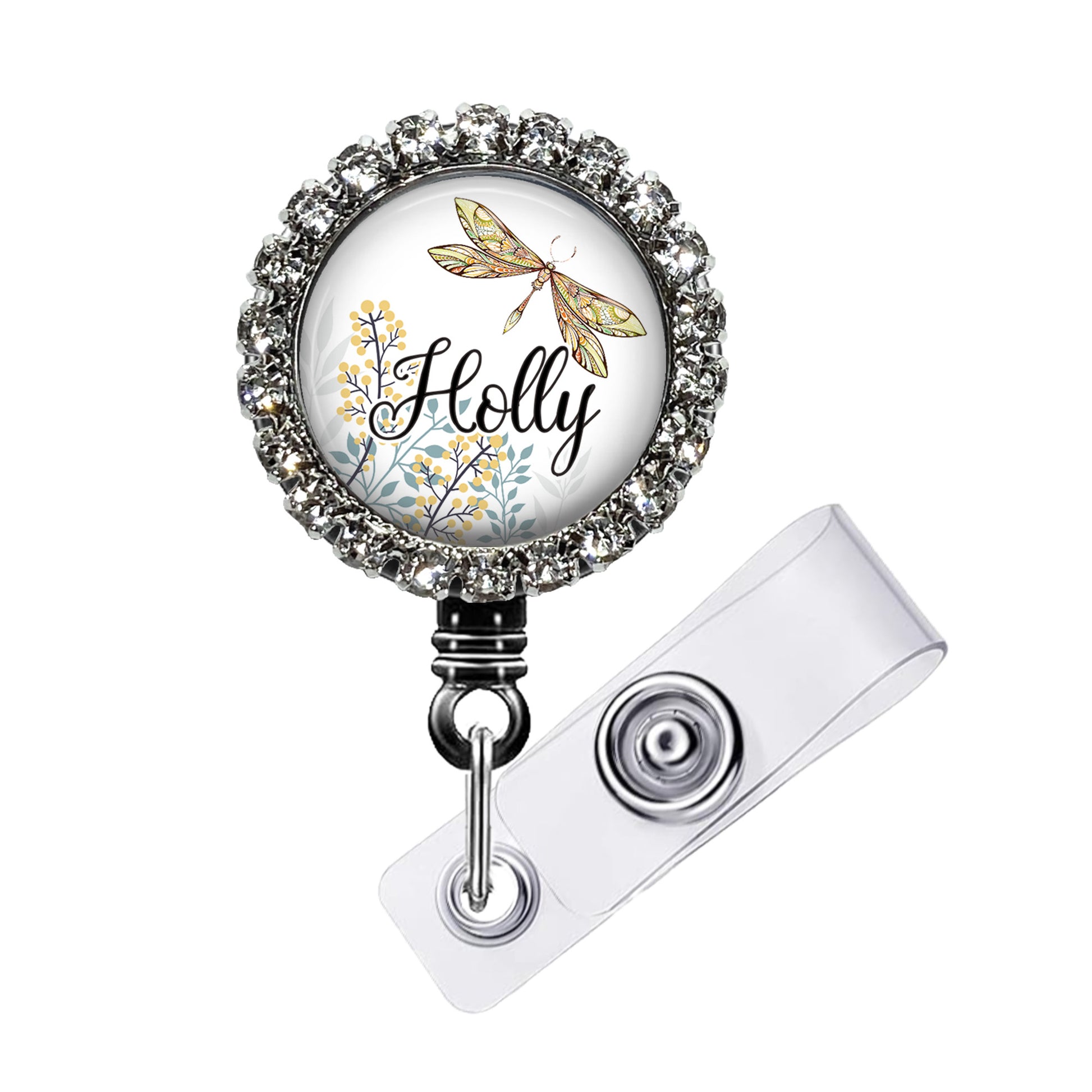 A personalized name badge with a floral design and a dragonfly motif.