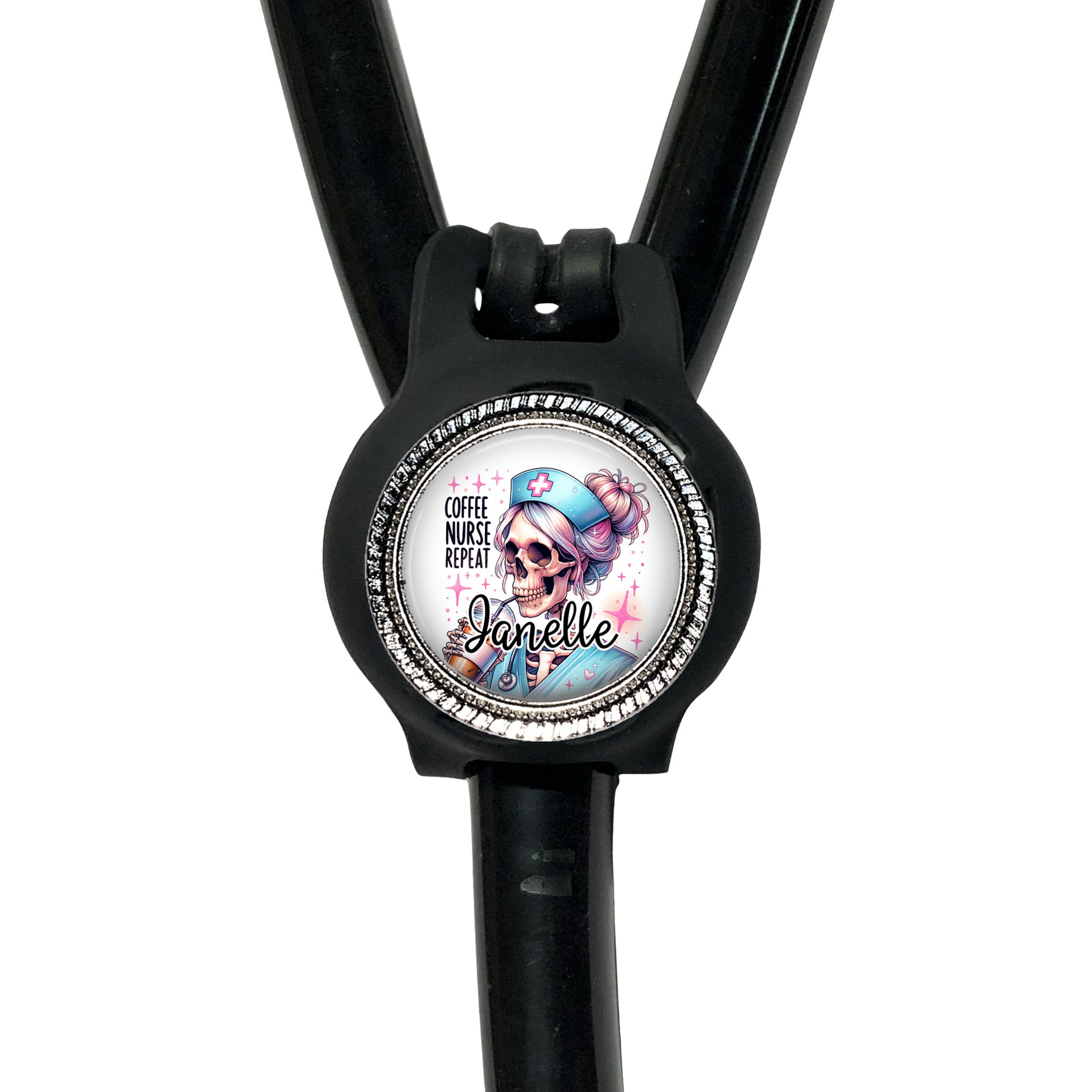 A black stethoscope with a round badge featuring a cartoon character and the text "Coffee nurse, nurse, nurse, nurse, nurse, nurse, nurse, nurse, nurse".