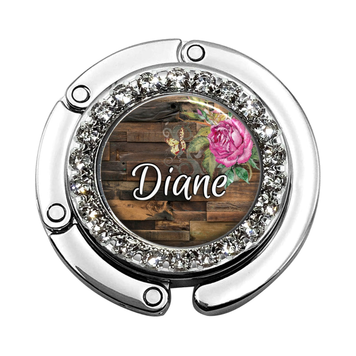 a wooden and crystal plate with a pink rose on it