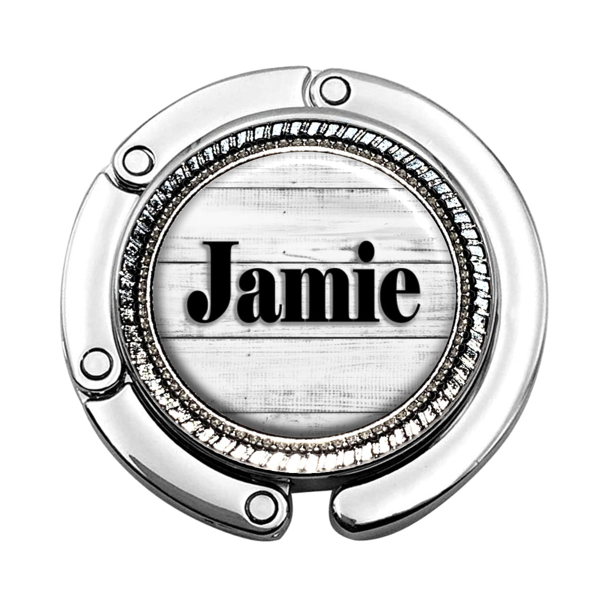 a round metal object with the word jamie on it