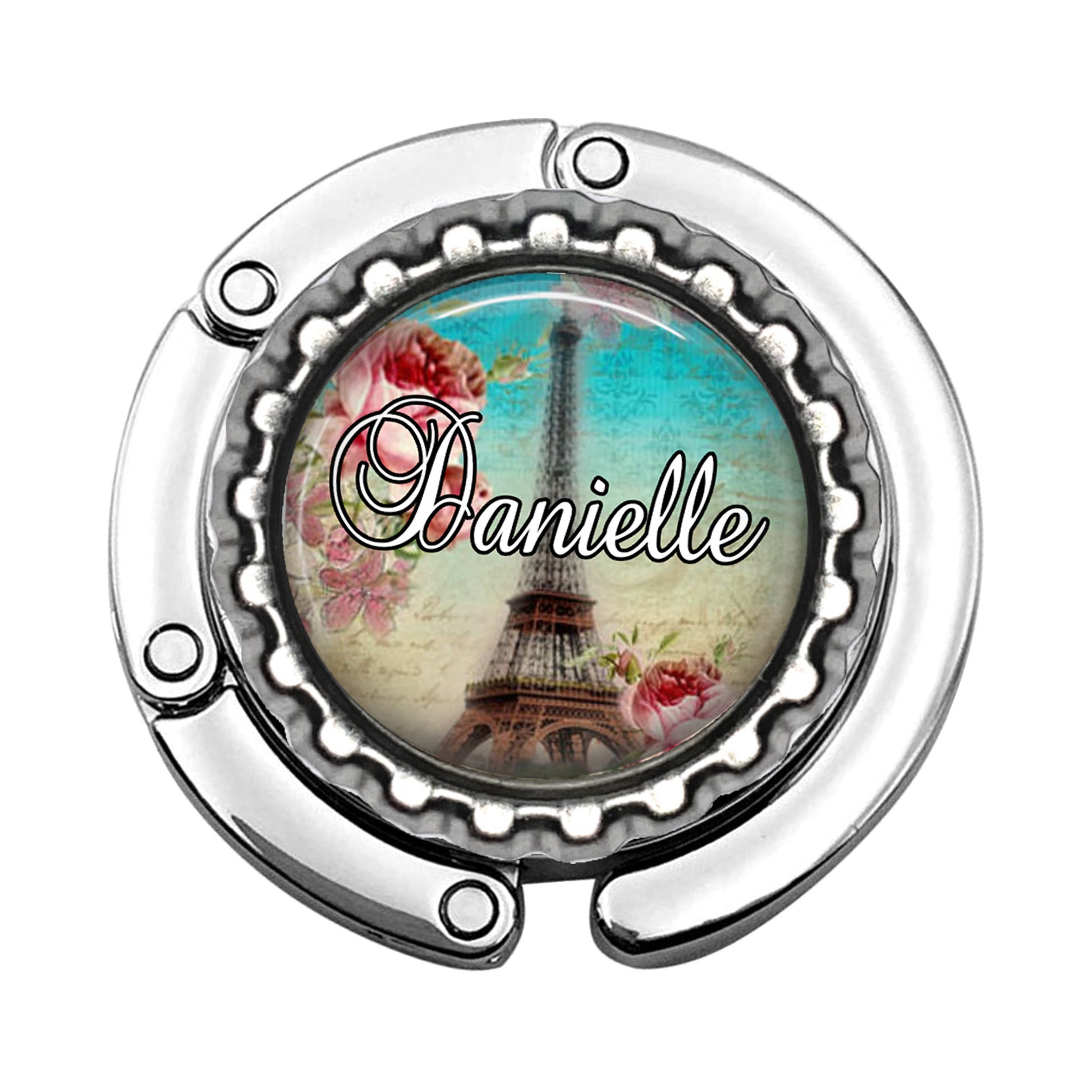 a bottle cap with a picture of the eiffel tower