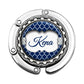a round metal object with the word kena on it