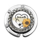 a badge with a sunflower and a stethoscope on it