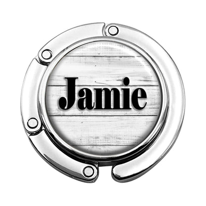 a metal object with the word jamie on it