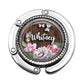 a bottle cap with a picture of flowers and butterflies on it