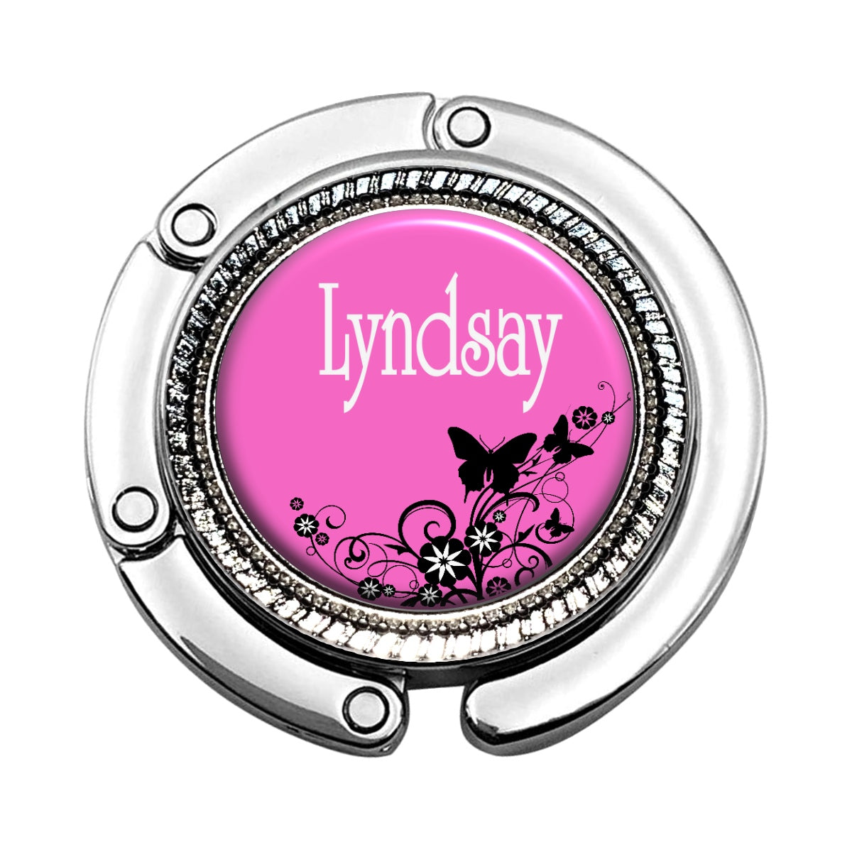 a pink and white round badge with the word lyndsay on it