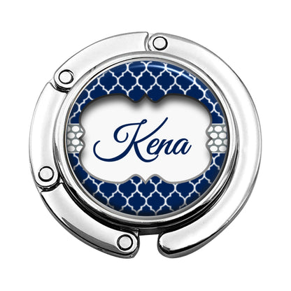 a round metal object with the word kena on it